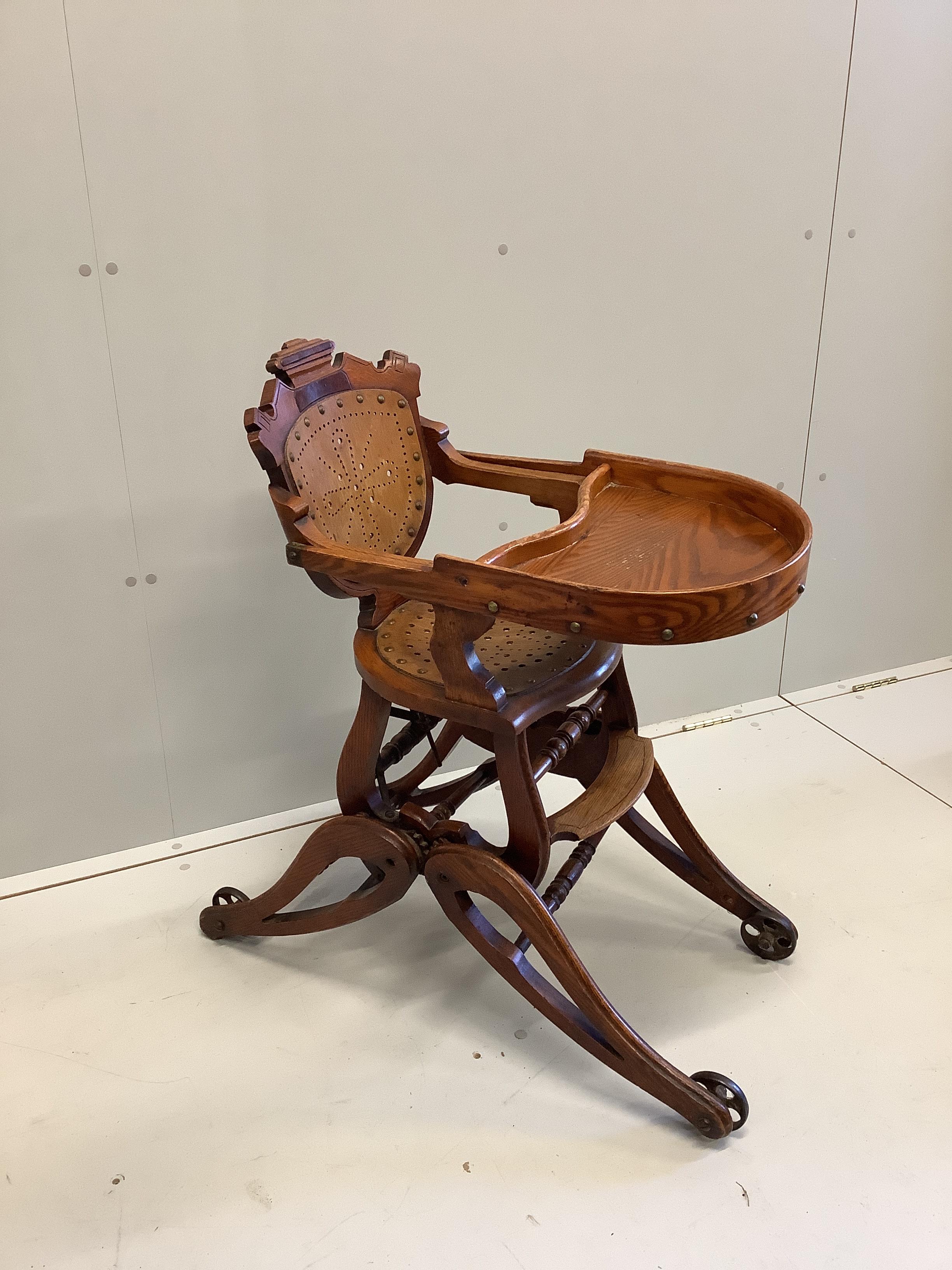 A late Victorian oak metamorphic child's chair, height 84cm